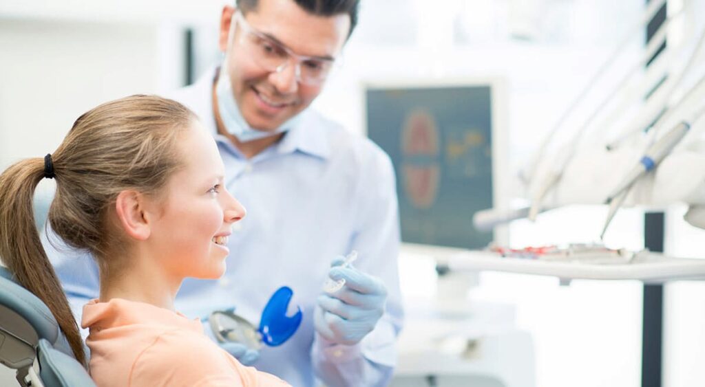 Invisalign provider Girl In Dentist Chair